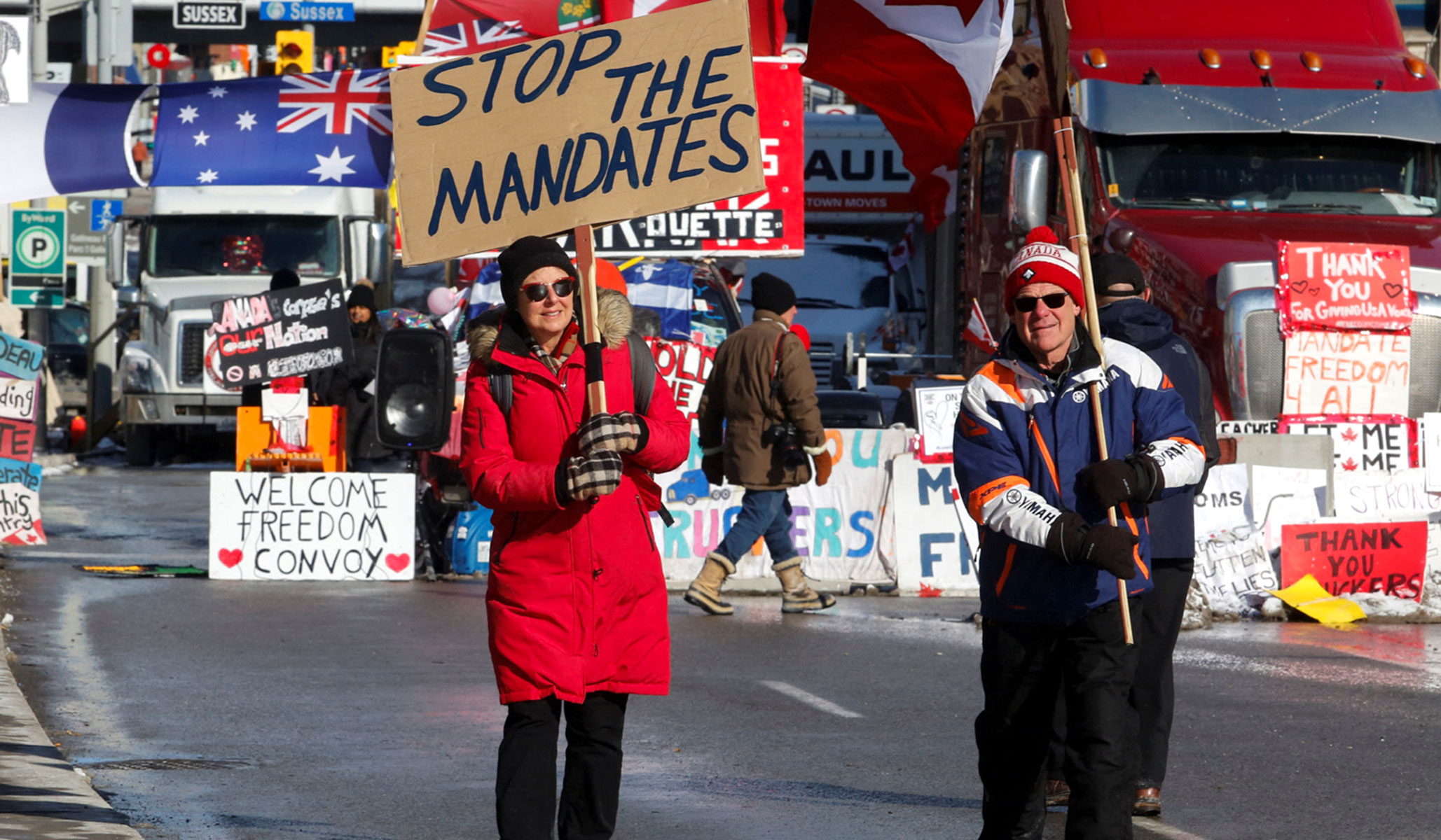 canada-trucker-protest-signs.jpg?fit=789%2C460